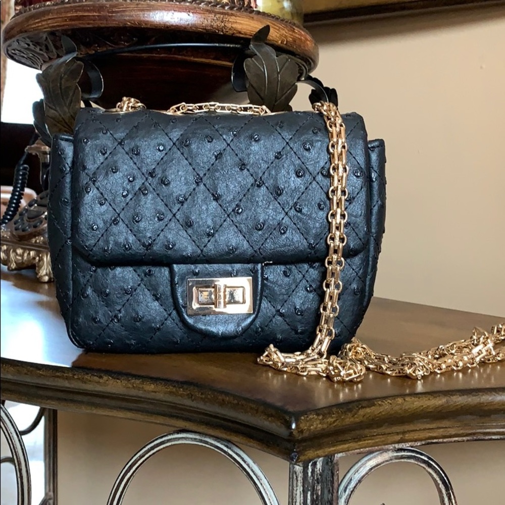 Black crossbody with gold chain strap